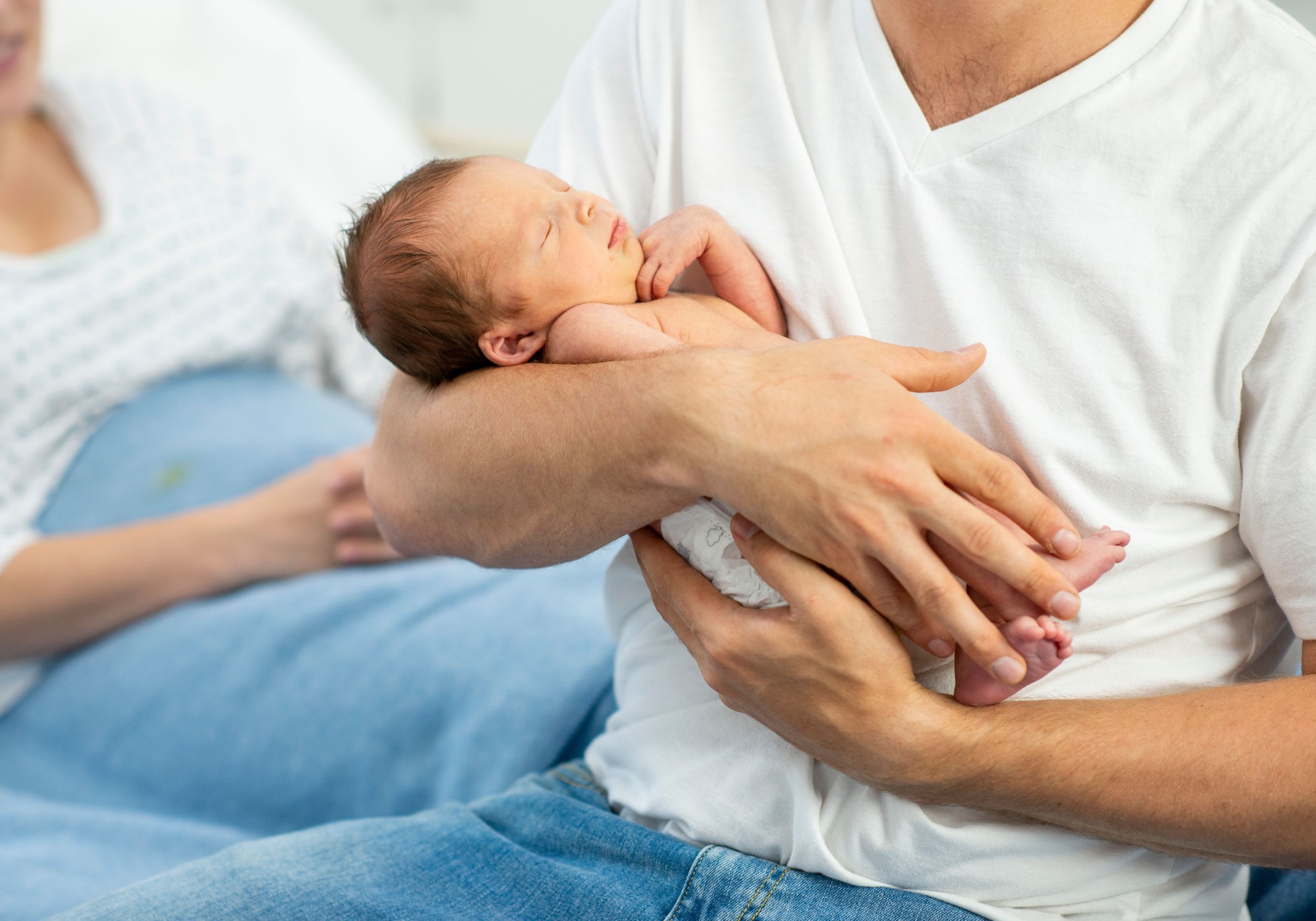 Father Holding Newborn Son